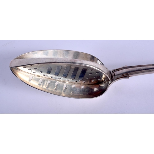 1063 - AN ANTIQUE SILVER STRAINING SPOON. London 1821. 219 grams. 27 cm long.