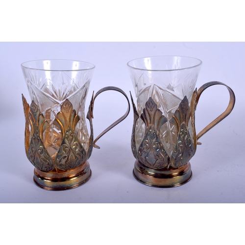 1106 - A CASED PAIR OF VINTAGE RUSSIAN SILVER CUPS with cut crystal body. 180 grams. 11 cm x 8 cm.