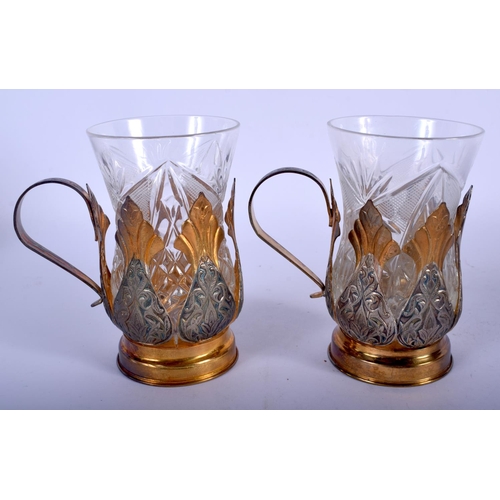 1106 - A CASED PAIR OF VINTAGE RUSSIAN SILVER CUPS with cut crystal body. 180 grams. 11 cm x 8 cm.