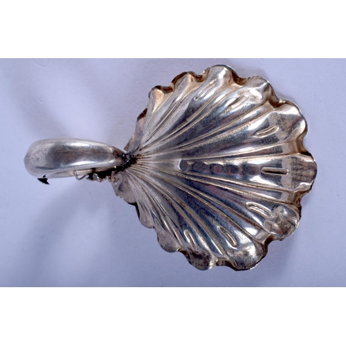 1138 - A MID VICTORIAN SILVER SHELL CADDY SPOON. Birmingham 1860. 17 cm x 5 cm.