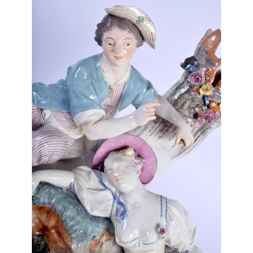 115 - A RARE LARGE 18TH/19TH CENTURY GERMAN HOCHST PORCELAIN FIGURAL GROUP modelled as a male resting besi... 