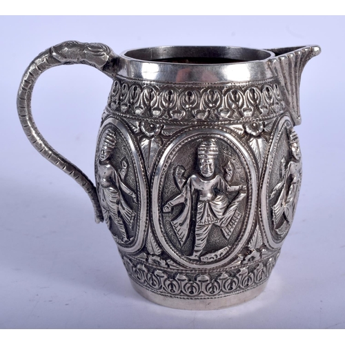 1152 - AN ANTIQUE INDIAN SILVER JUG. 139 grams. 10 cm x 8 cm.