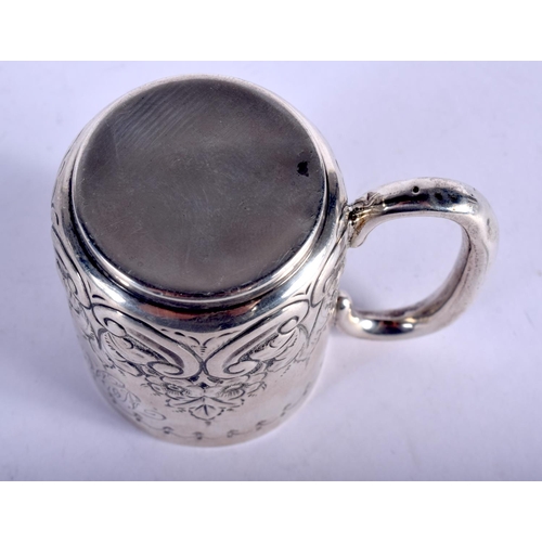 1153 - AN ANTIQUE SILVER CHRISTENING MUG. Birmingham. 65 grams. 8 cm x 7 cm.