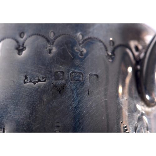 1153 - AN ANTIQUE SILVER CHRISTENING MUG. Birmingham. 65 grams. 8 cm x 7 cm.