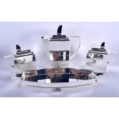 1155 - AN ART DECO STYLE SILVER PLATED THREE PIECE TEASET. 39 cm x 22 cm.