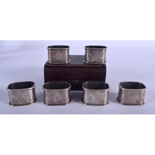 1157 - A SET OF SIX AESTHETIC MOVEMENT SILVER NAPKIN RINGS. London 1880. 118 grams. 4.5 cm x 3 cm. (6)