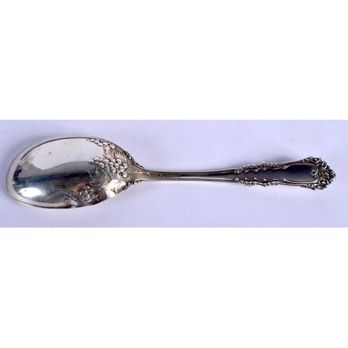 1161 - A RARE VINTAGE SILVER AND ENAMEL SPOON. 41 grams. 17 cm long.