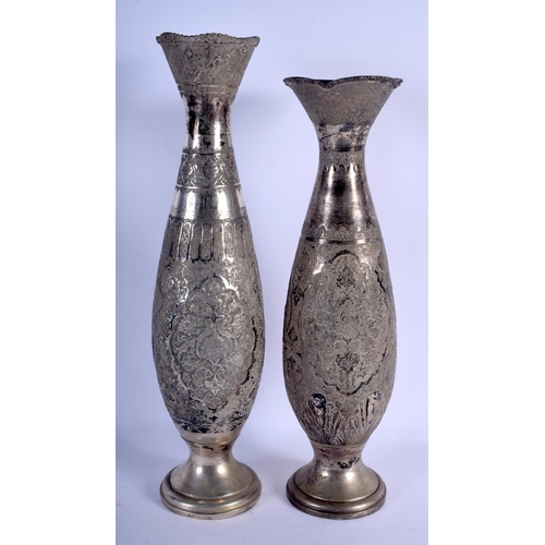 1164 - A LARGE NEAR PAIR OF ANTIQUE MIDDLE EASTERN PERSIAN VASES. 2236 grams. 49 cm x 12 cm.