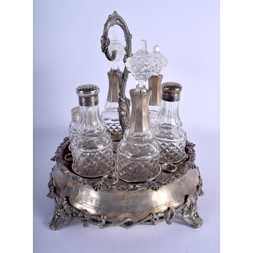 1165 - A LARGE ANTIQUE CONTINENTAL SILVER CRUET SET. 2830 grams overall. 29 cm x 24 cm.