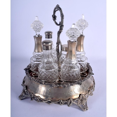 1165 - A LARGE ANTIQUE CONTINENTAL SILVER CRUET SET. 2830 grams overall. 29 cm x 24 cm.