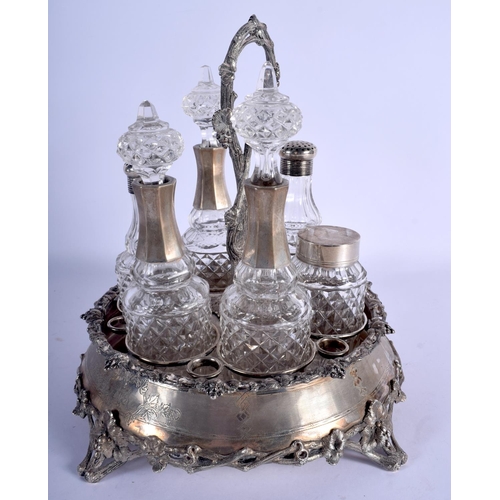 1165 - A LARGE ANTIQUE CONTINENTAL SILVER CRUET SET. 2830 grams overall. 29 cm x 24 cm.