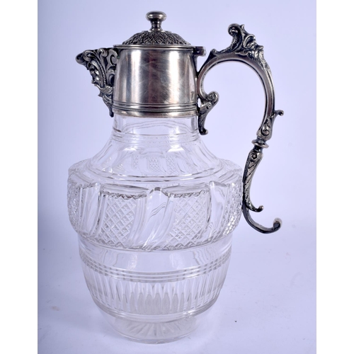 1166 - AN ANTIQUE SILVER PLATED CRYSTAL GLASS CLARET JUG. 24 cm x 15 cm.