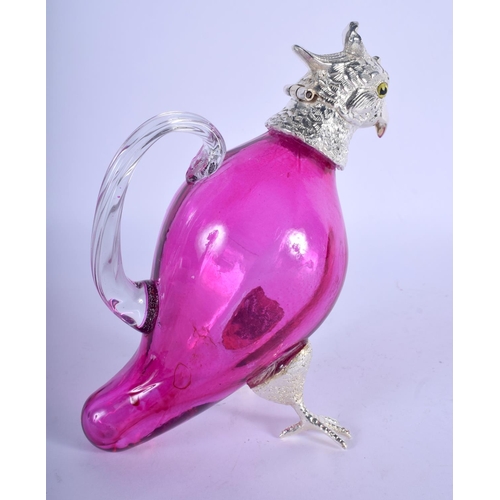 1168 - A SILVER PLATED CRANBERRY GLASS PARROT JUG. 16 cm x 13 cm.