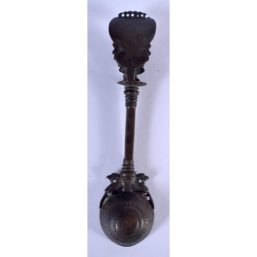 1169 - AN 18TH CENTURY INDIAN TIBETAN BRONZE SPOON. 14 cm long.