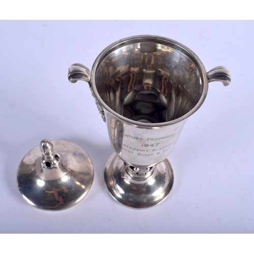 1172 - AN ARTS AND CRAFTS STYLE SILVER TROPHY. Birmingham 1928. 321 grams. 23 cm x 11 cm.