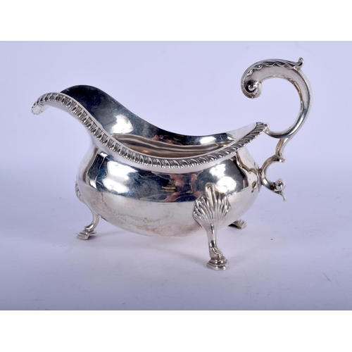 1178 - AN EARLY 19TH CENTURY ENGLISH SILVER SAUCEBOAT. London 1823. 405 grams. 20 cm x 13 cm.