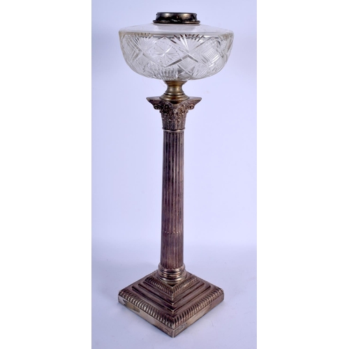 1184 - A LARGE ANTIQUE SILVER COLUMN OIL LAMP with cut glass lamp. 49 cm high.