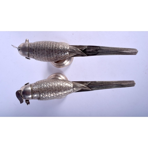 1186 - A RARE PAIR OF EARLY 20TH CENTURY INDO PERSIAN SILVER OIL BURNERS AND COVERS. 477 grams. 22 cm x 11 ... 