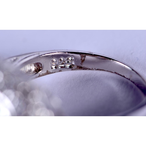 1190 - A SILVER CZ RING. M. 6.4 grams.