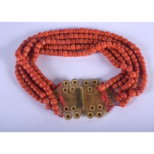 1196 - AN 18CT GOLD MOUNTED CONTINENTAL CORAL NECKLACE. 236 grams. Each strand 30 cm long.