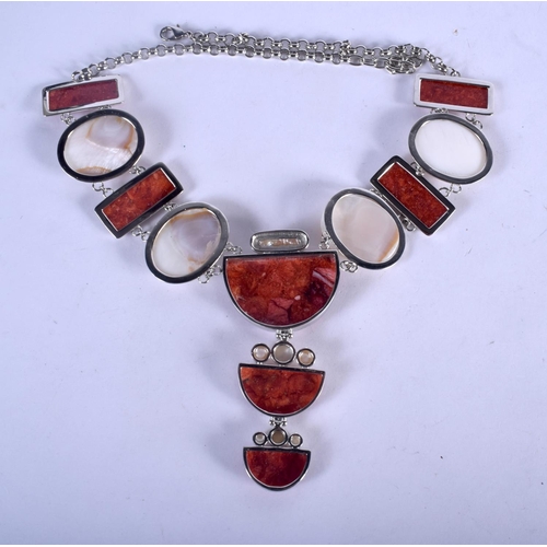 1198 - A WHITE METAL STONE NECKLACE. 104 grams. 58 cm long.