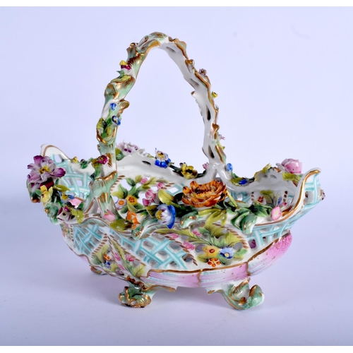 120 - A 19TH CENTURY CONTINENTAL PORCELAIN FLORAL ENCRUSTED BASKET together with another basket and a plat... 