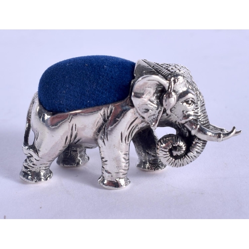 1204 - A SILVER ELEPHANT PIN CUSHION. 14 grams. 4 cm x 2 cm.