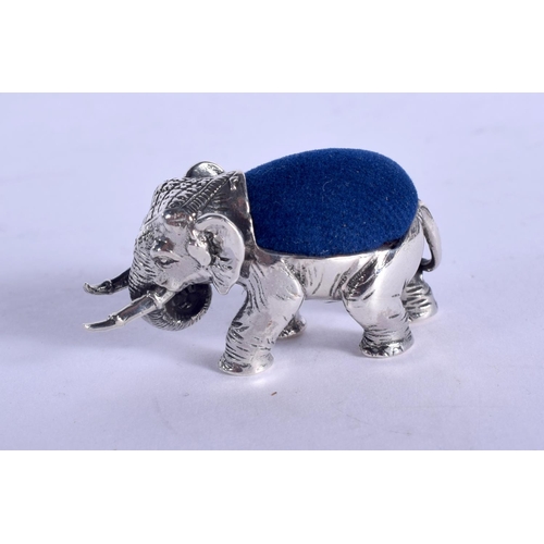 1204 - A SILVER ELEPHANT PIN CUSHION. 14 grams. 4 cm x 2 cm.