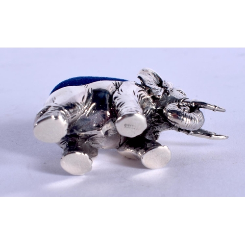 1204 - A SILVER ELEPHANT PIN CUSHION. 14 grams. 4 cm x 2 cm.