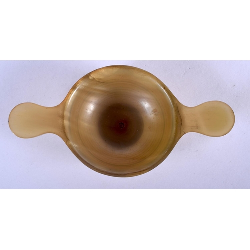 1244 - AN ANTIQUE SCOTTISH CARVED HORN QUAICH. 44 grams. 12 cm wide.