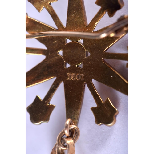 1250 - A VICTORIAN 15CT GOLD STAR BROOCH. 5 cm wide.