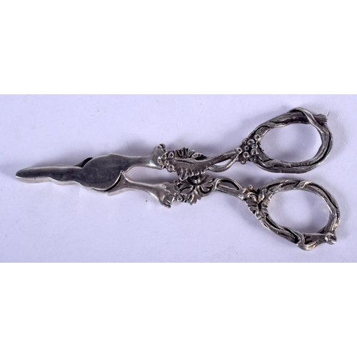 1260 - A PAIR OF SILVER SUGAR NIPS. 40 grams. 11.5 cm x 5 cm.