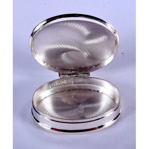 1296 - A SILVER EROTIC PILL BOX. 19 grams. 3.5 cm x 3 cm.