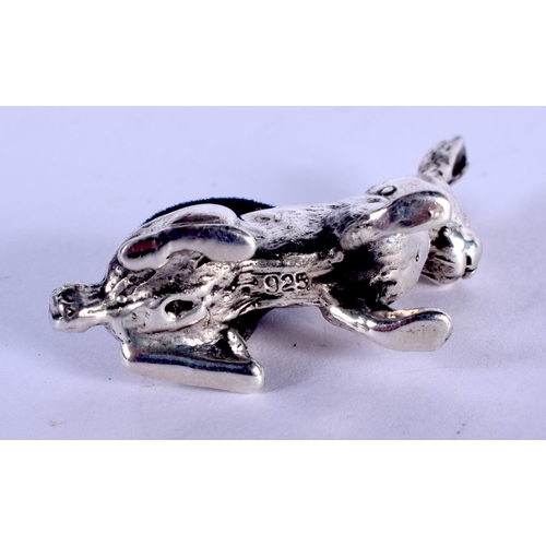 1297 - A SILVER RABBIT PIN CUSHION. 10 grams. 3 cm x 3 cm.