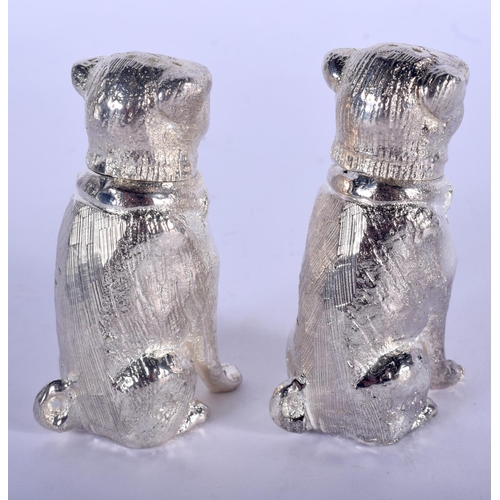 1305 - A PAIR OF SILVER PLATED DOG CONDIMENTS. 8 cm x 5 cm.