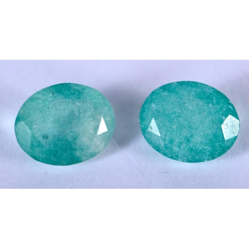 1306 - TWO LOOSE EMERALDS. 0.7 cm x 0.7 cm. (2)