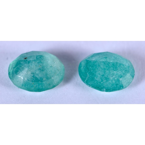 1306 - TWO LOOSE EMERALDS. 0.7 cm x 0.7 cm. (2)