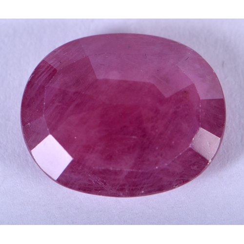 1307 - A LOOSE 11CT RUBY. 1.5 cm x 1 cm.