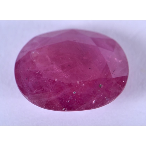 1307 - A LOOSE 11CT RUBY. 1.5 cm x 1 cm.