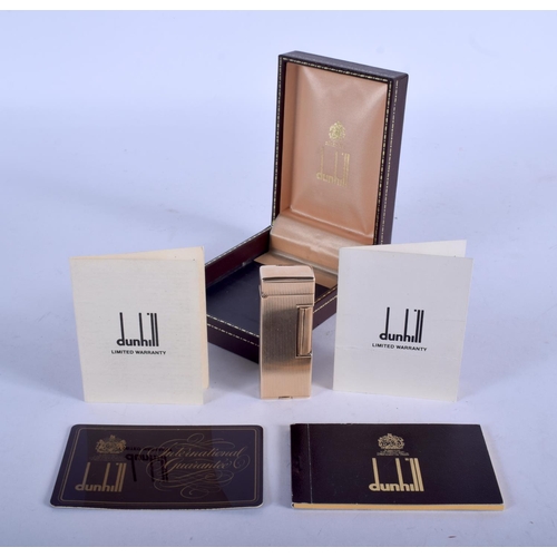 1311 - A 14CT GOLD DUNHILL LIGHTER. 68 grams overall. 6.5 cm x 2.75 cm.