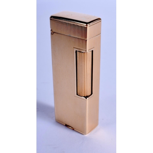 1311 - A 14CT GOLD DUNHILL LIGHTER. 68 grams overall. 6.5 cm x 2.75 cm.