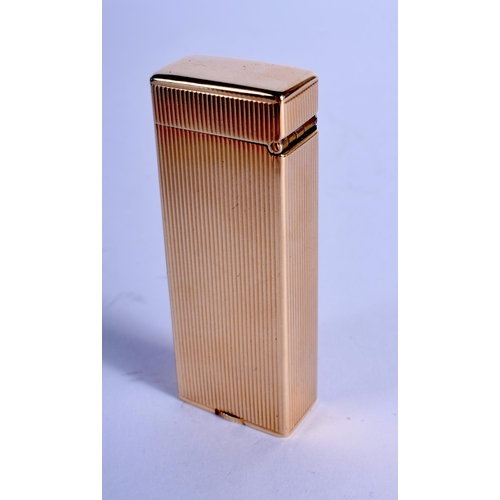 1311 - A 14CT GOLD DUNHILL LIGHTER. 68 grams overall. 6.5 cm x 2.75 cm.