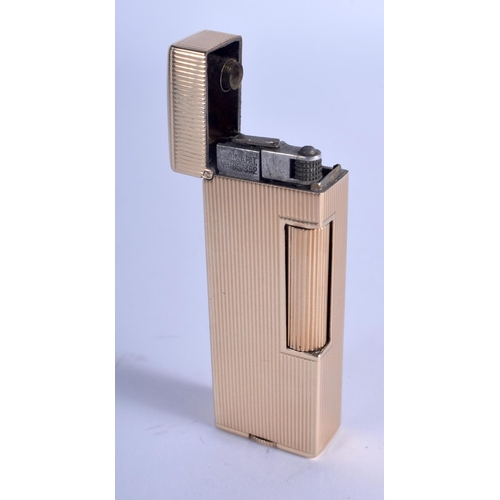 1311 - A 14CT GOLD DUNHILL LIGHTER. 68 grams overall. 6.5 cm x 2.75 cm.