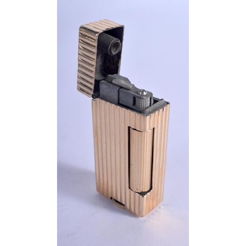 1312 - A 14CT GOLD DUNHILL LIGHTER. 72 grams overall. 5 cm x 2.75 cm.