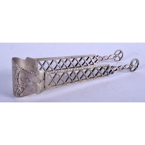 1314 - A PAIR OF GEORGE III SILVER SUGAR TONGS. 37 grams. 15 cm x 3.5 cm.