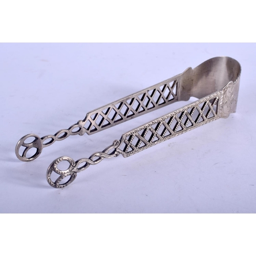 1314 - A PAIR OF GEORGE III SILVER SUGAR TONGS. 37 grams. 15 cm x 3.5 cm.