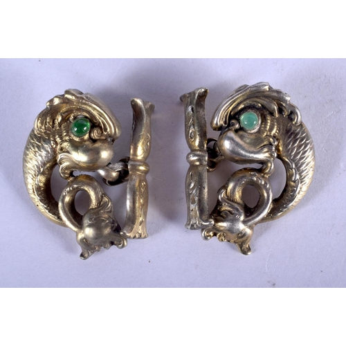 1321 - A PAIR OF CONTINENTAL SILVER GILT FISH CUFFLINKS. 24 grams. 3 cm x 2 cm.