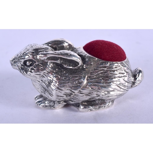 1323 - A SILVER HARE PIN CUSHION. 31 grams. 5 cm x 2.5 cm.