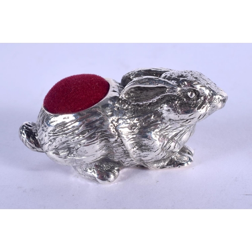 1323 - A SILVER HARE PIN CUSHION. 31 grams. 5 cm x 2.5 cm.