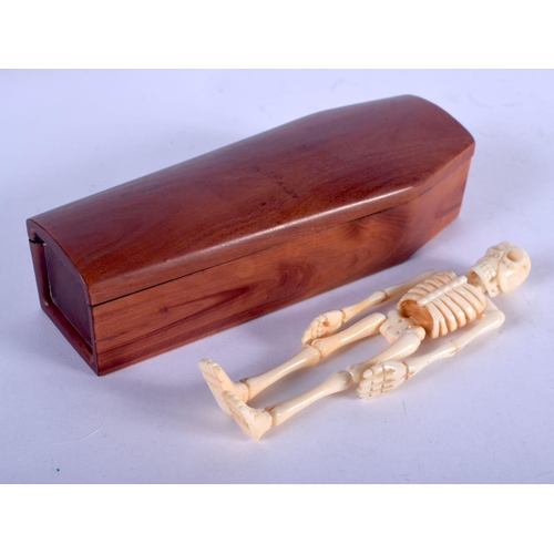 1328 - A CONTINENTAL CARVED BONE AND WOOD COFFIN. 12 cm x 4 cm.